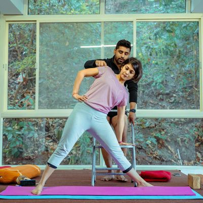 Portrait of an experienced yoga instructor smiling warmly